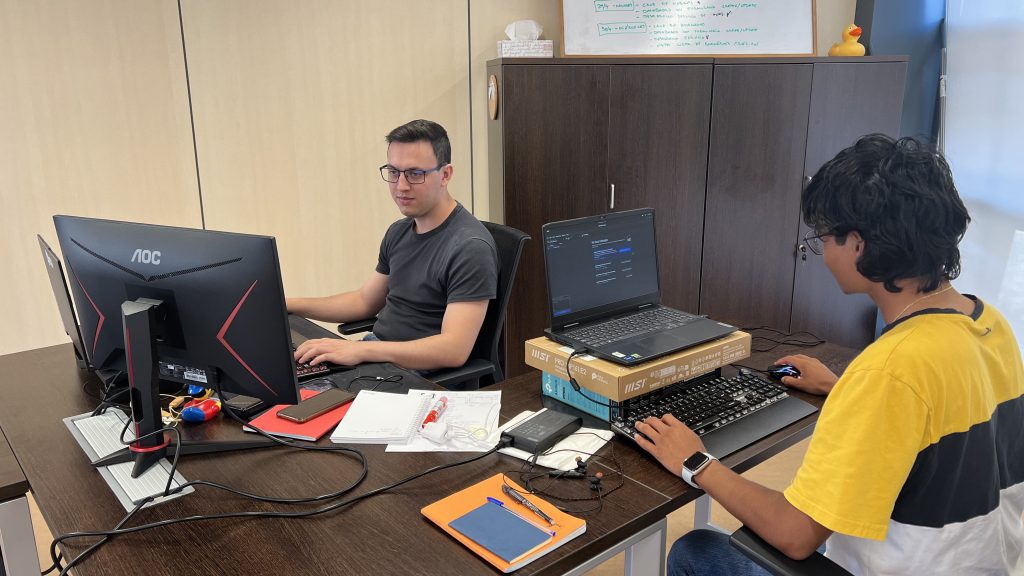 Animation and design students collaborating with developers